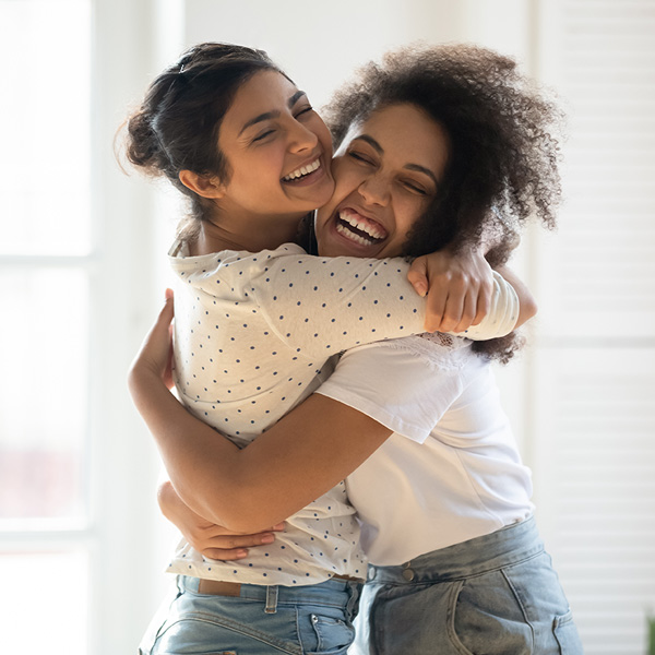 two friends hugging